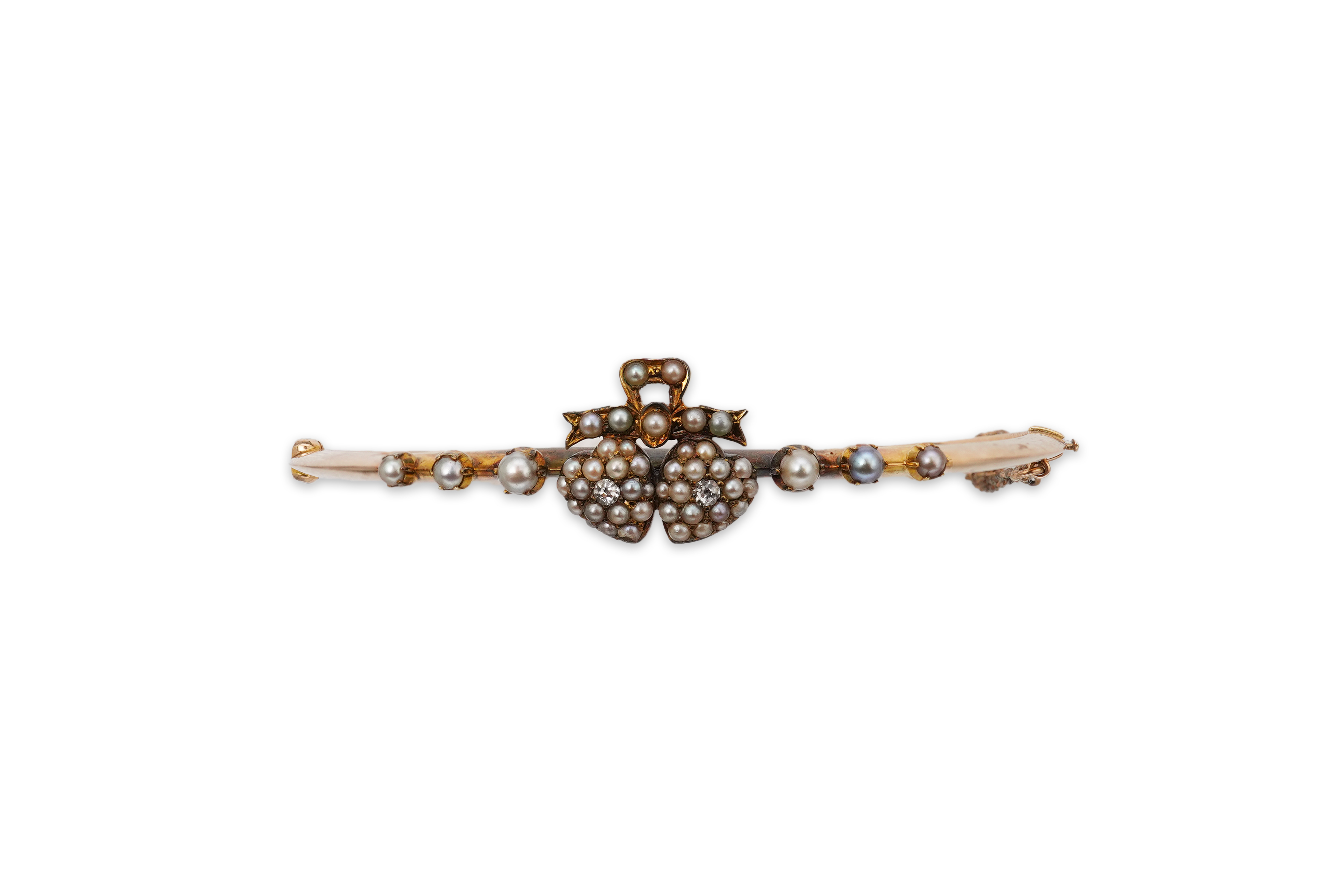 An Edwardian seed pearl and diamond bangle, early 20th century